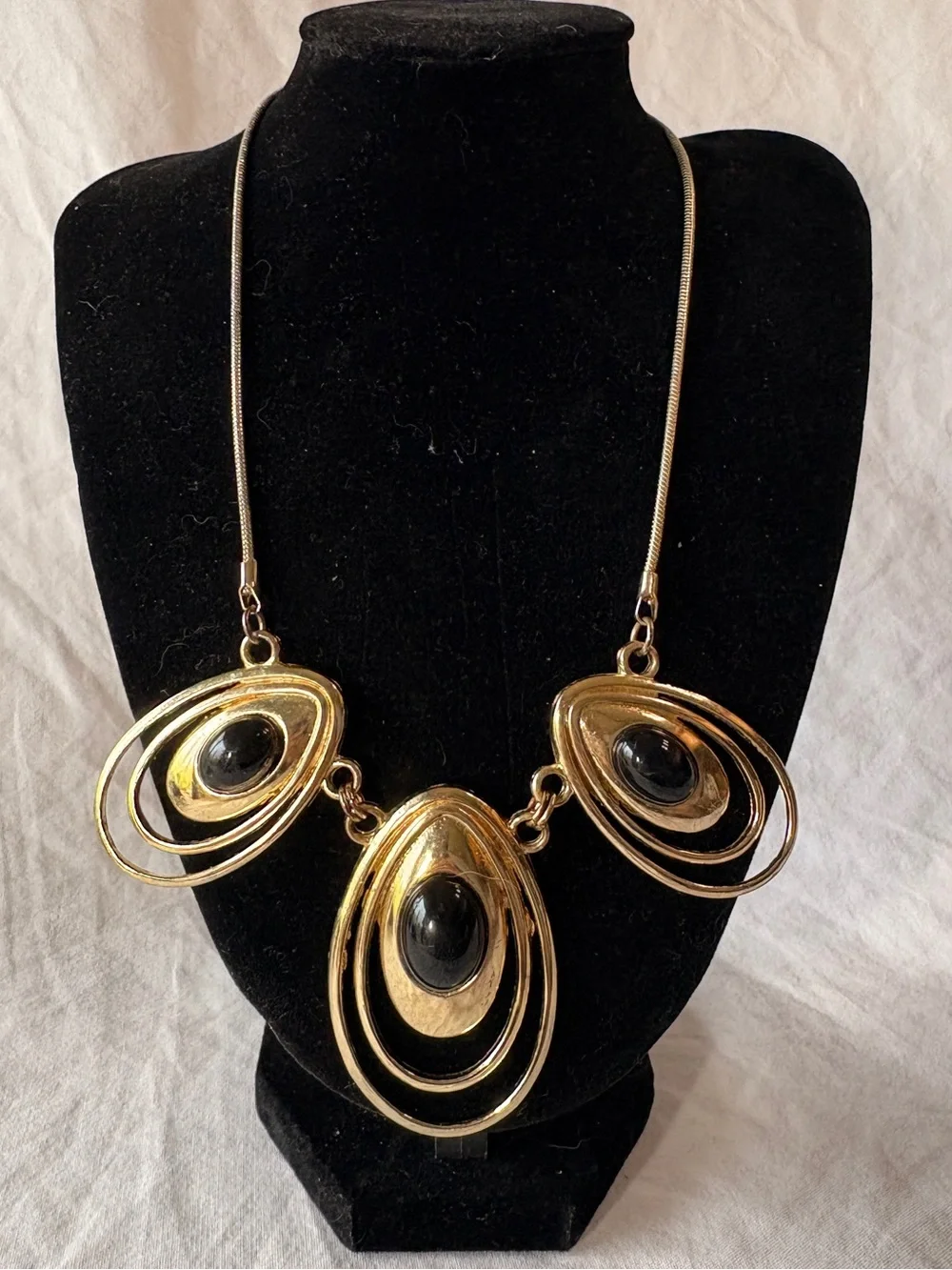 Gold-tone Statement Necklace with Black Cabochon Accents